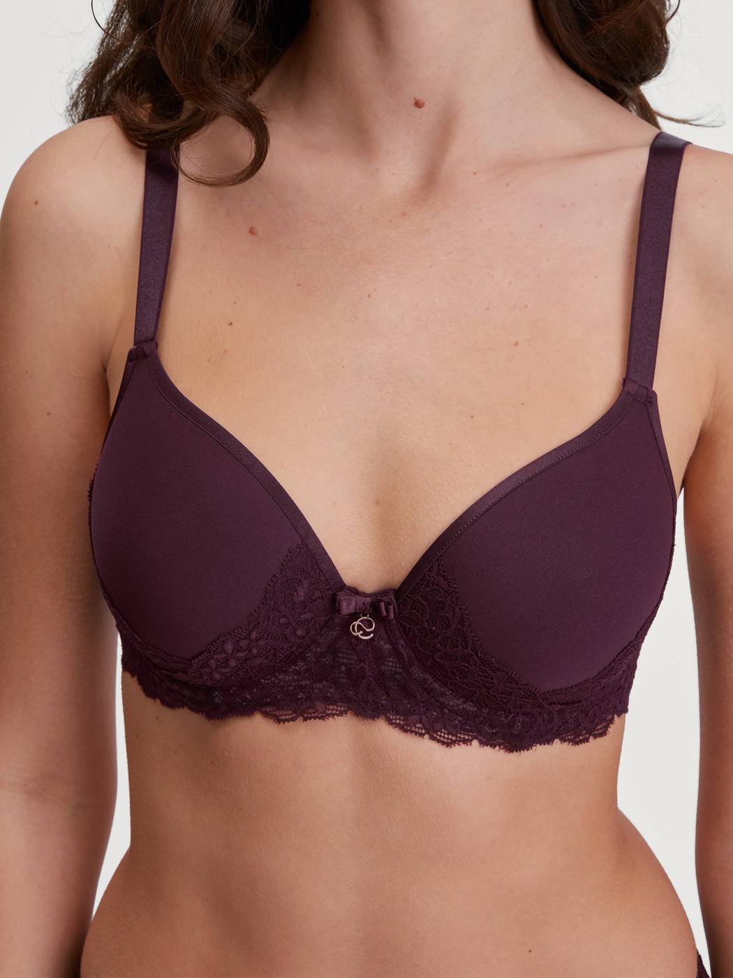 Women model is wearing Spacer bra with wires made of Polyamide in Red, Lace from the Sensual Secrets series by CALIDA, Detail