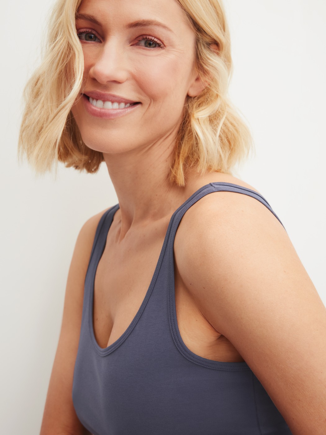 Women model is wearing Tank top made of Cotton in Grey, Unicoloured from the Essential Cotton series by CALIDA, Detail