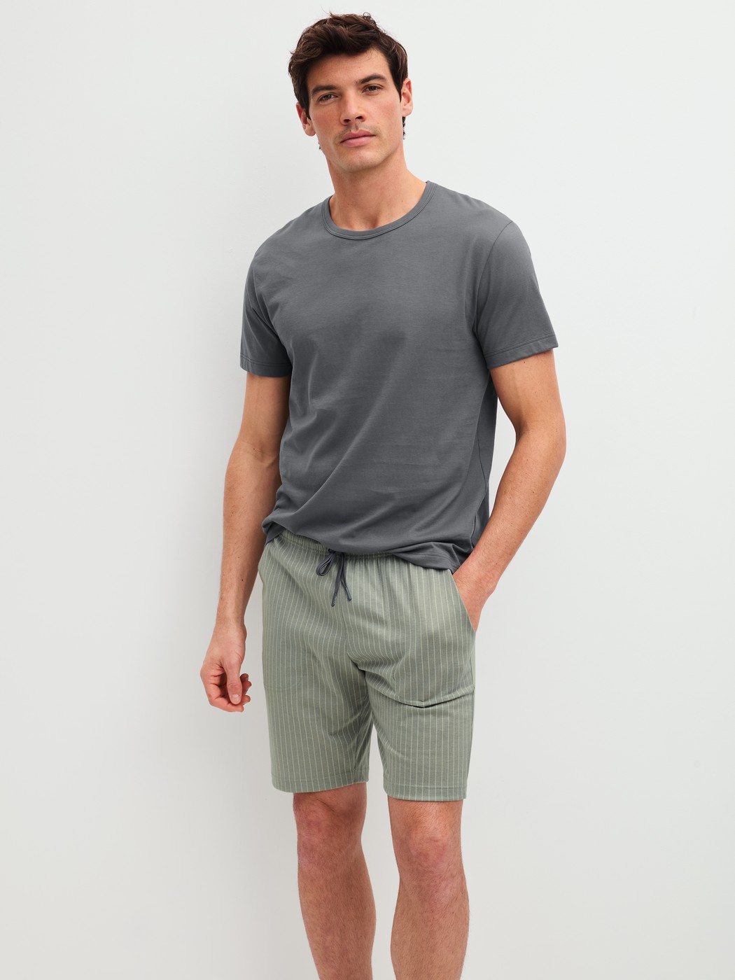 Men model is wearing Short-sleeved shirt made of 100% Cotton in Grey, Unicoloured from the RMX Sleep Leisure series by CALIDA, Additional Image