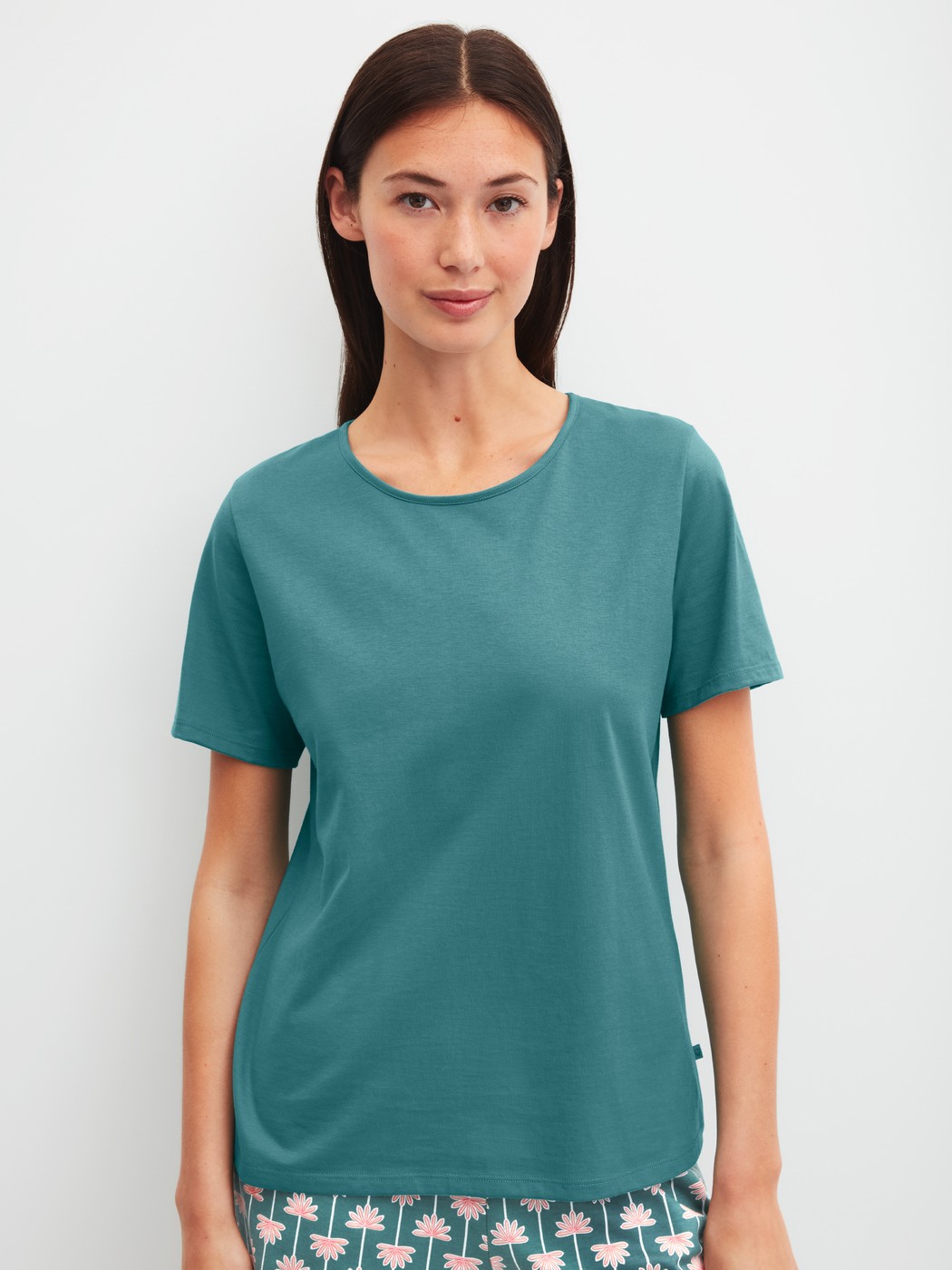 Women model is wearing Shirt short sleeve made of 100% Cotton in Turquoise, Unicoloured from the Favourites Beach series by CALIDA, Front view