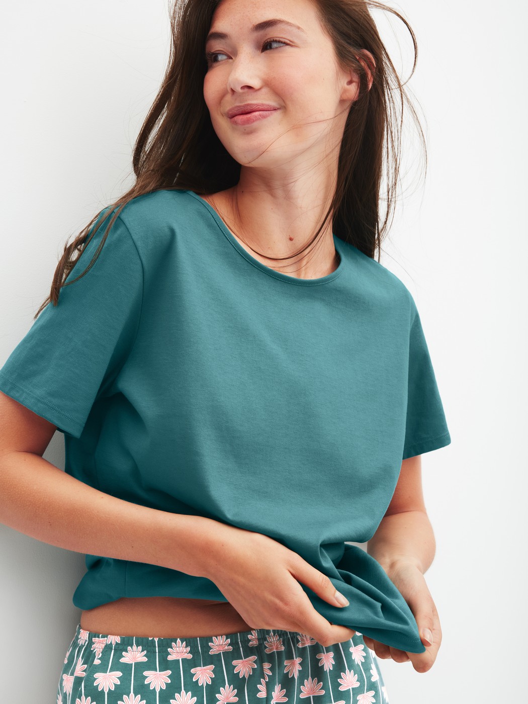 Women model is wearing Shirt short sleeve made of 100% Cotton in Turquoise, Unicoloured from the Favourites Beach series by CALIDA, Additional Image