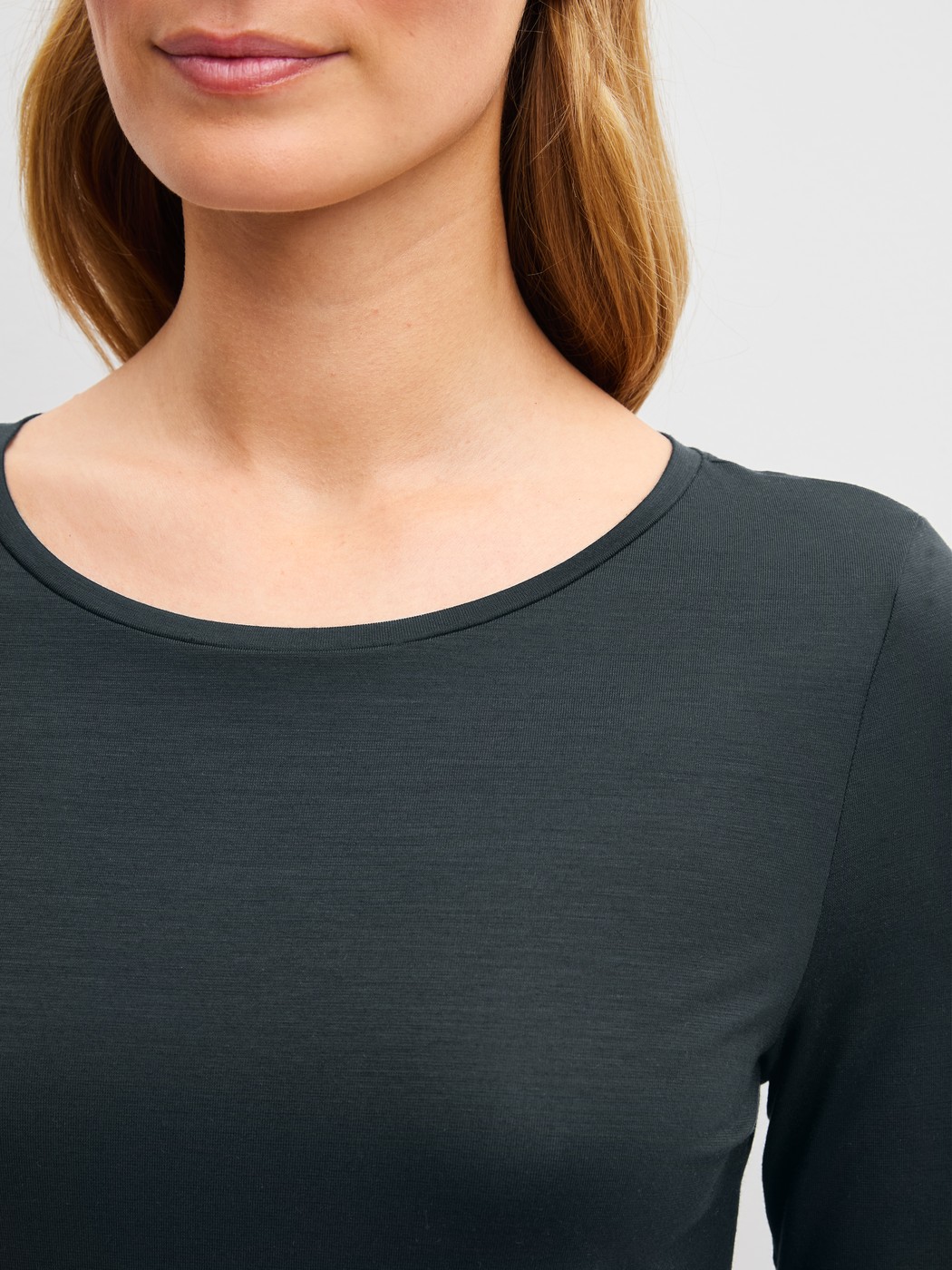 Women model is wearing Shirt long sleeve made of Modal in Black, Unicoloured from the Sleep Over M&M series by CALIDA, Detail