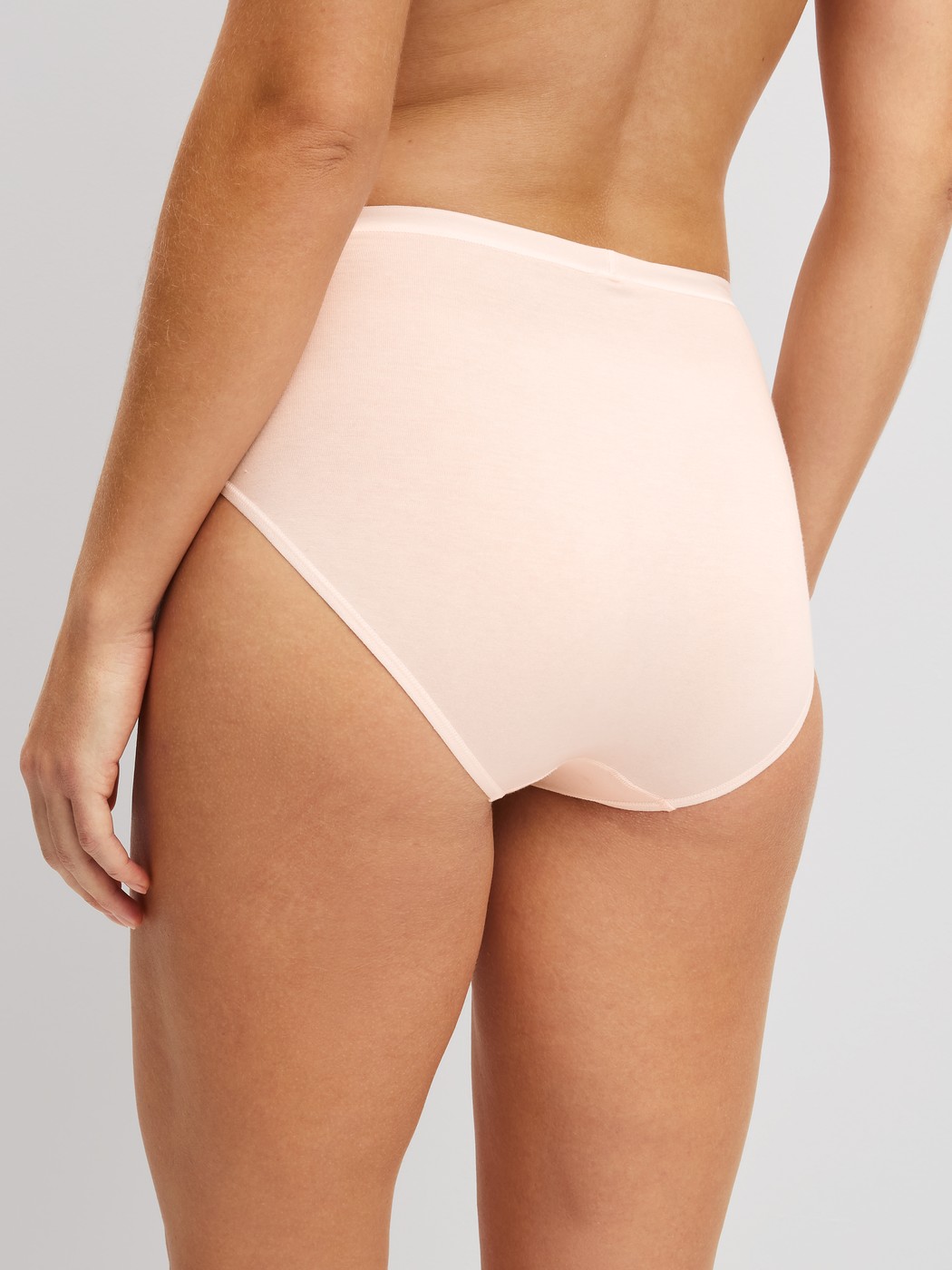 Women model is wearing Brief made of Cotton in Pink, Unicoloured from the Natural Comfort series by CALIDA, Detail