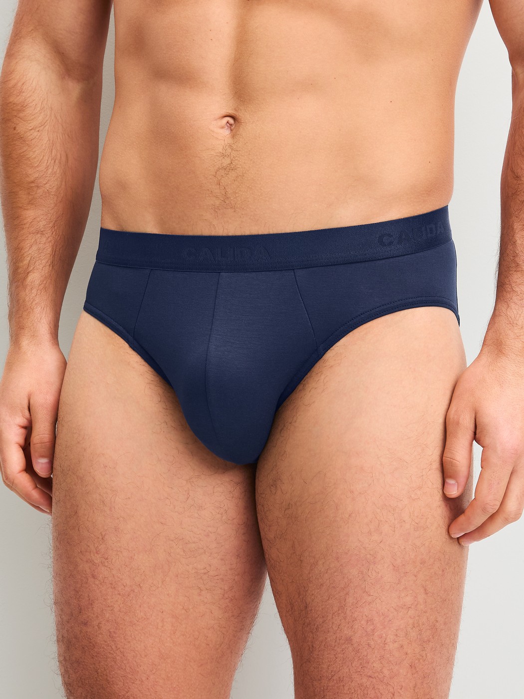 Men model is wearing Brief made of Lyocell in Blue, Unicoloured from the Natural Cooling series by CALIDA, Front view