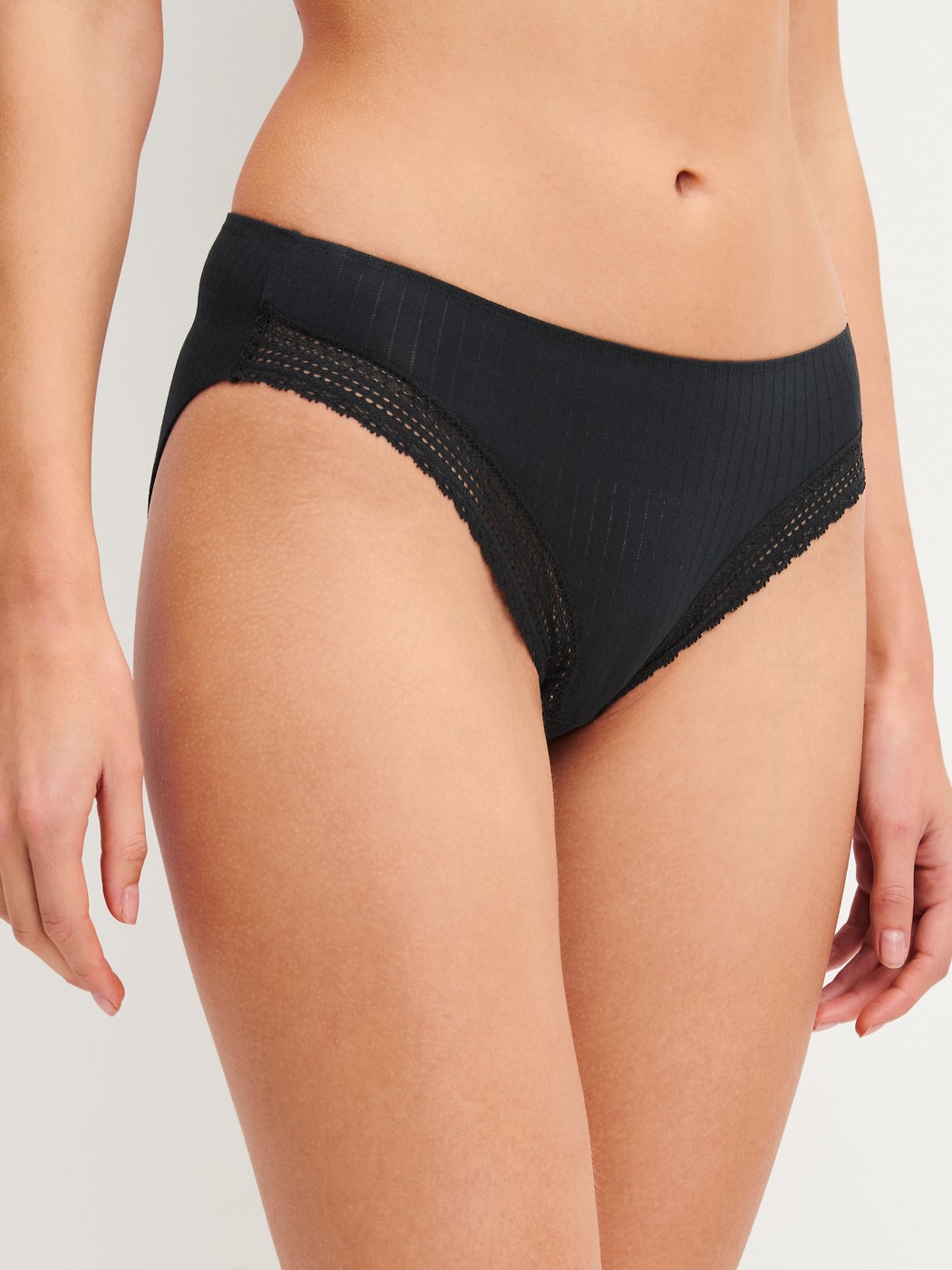 Women model is wearing Brief made of Modal in Black, Unicoloured from the Etude Ajours series by CALIDA, Front view