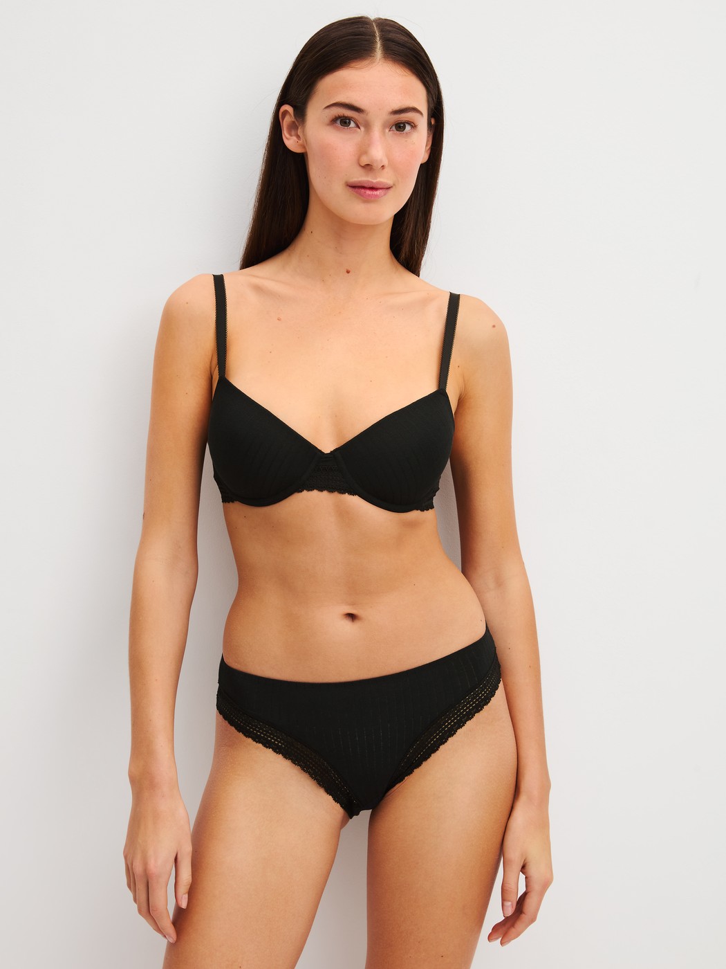 Women model is wearing Brief made of Modal in Black, Unicoloured from the Etude Ajours series by CALIDA, Outfit