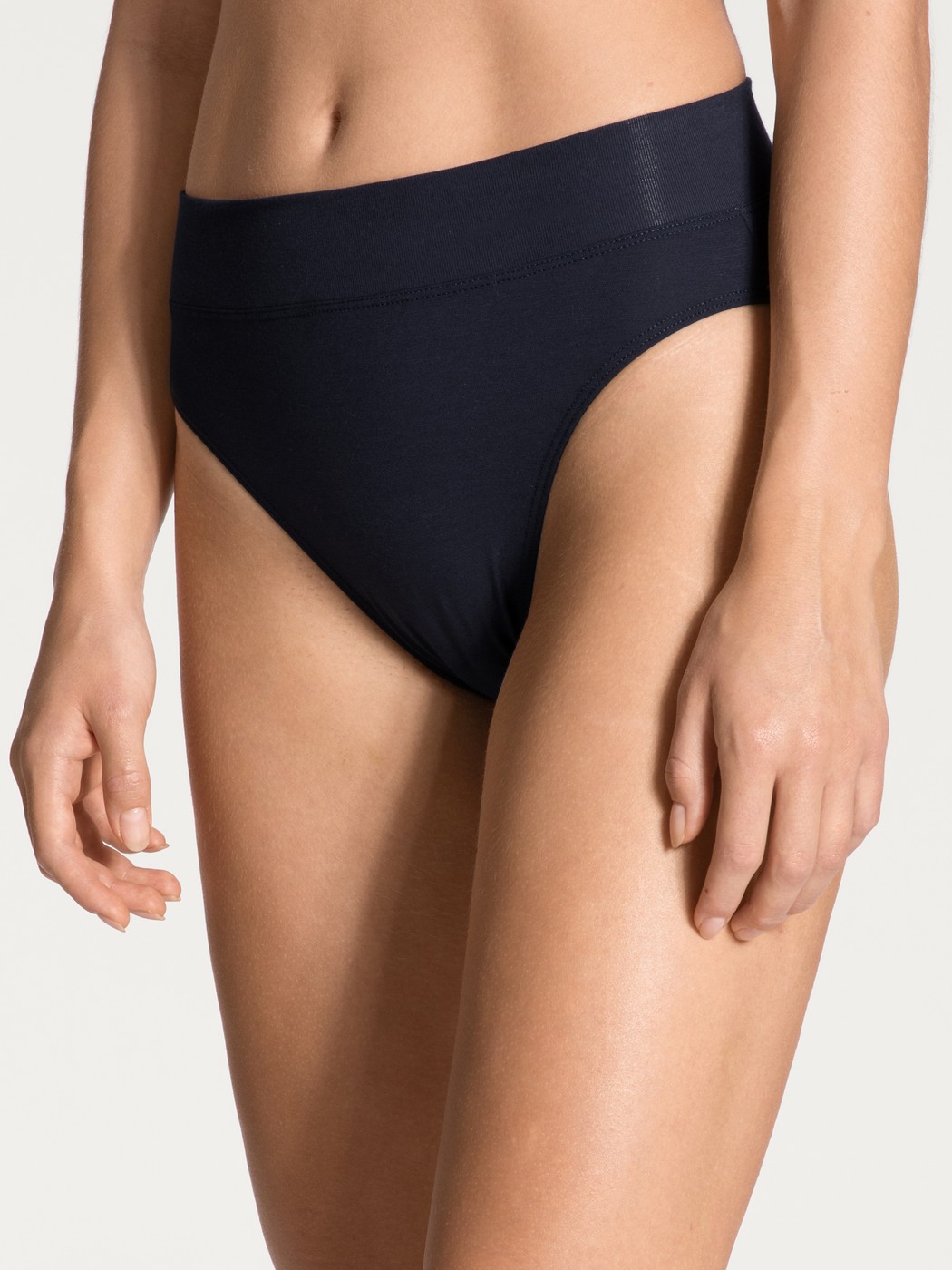 Women model is wearing High Waist Briefs, 2-Pack made of Cotton in Blue, Patterned from the Elastic Duopack series by CALIDA, Front view