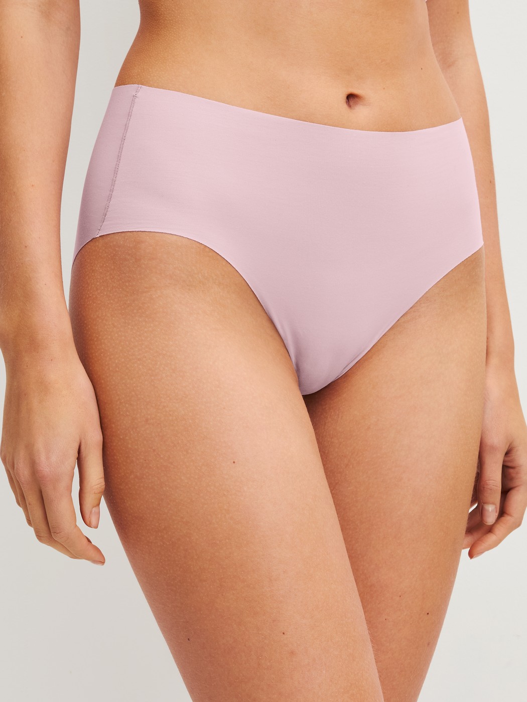 Women model is wearing Brief made of Modal in Purple, Unicoloured from the Natural Skin series by CALIDA, Front view
