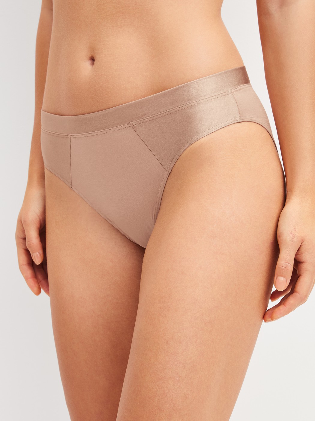 Women model is wearing Brief made of Cotton in Beige, Unicoloured from the Cate series by CALIDA, Front view