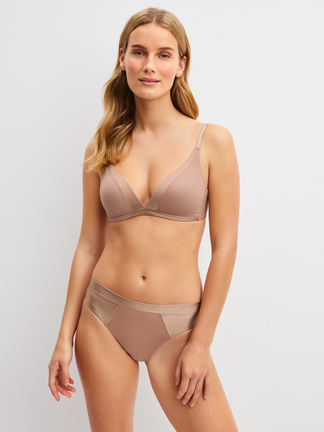 Women model is wearing Brief made of Cotton in Beige, Unicoloured from the Cate series by CALIDA, Outfit