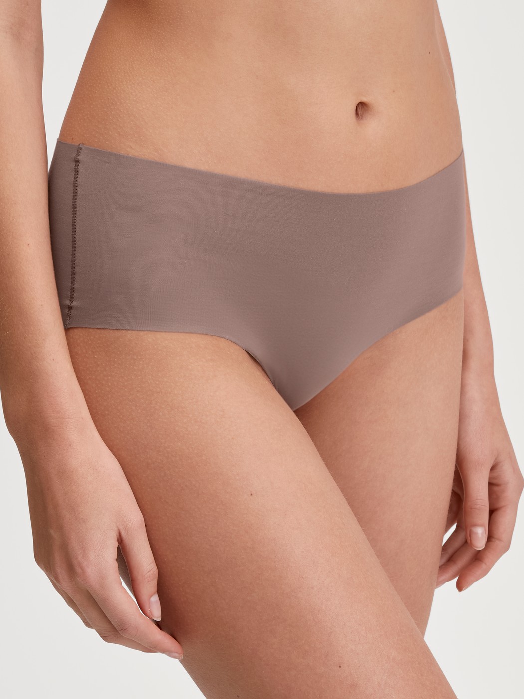 Women model is wearing Panty made of Modal in Brown, Unicoloured from the Natural Skin series by CALIDA, Front view