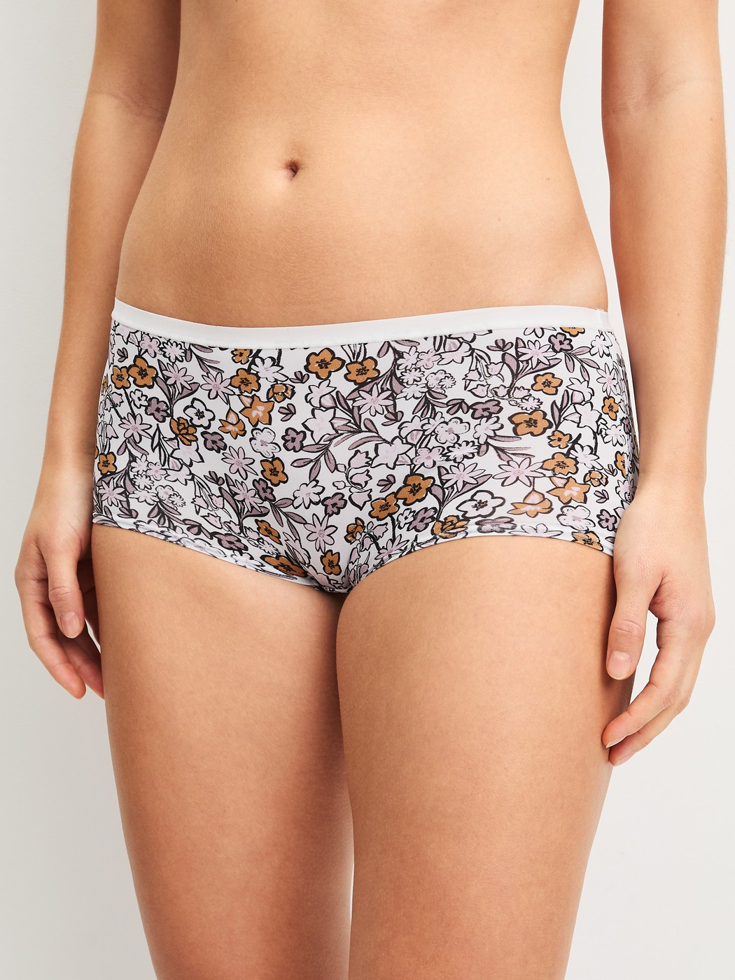 Women model is wearing Panties, 3-Pack made of Polyamide in Purple, Floral from the Eco Sense series by CALIDA, Front view