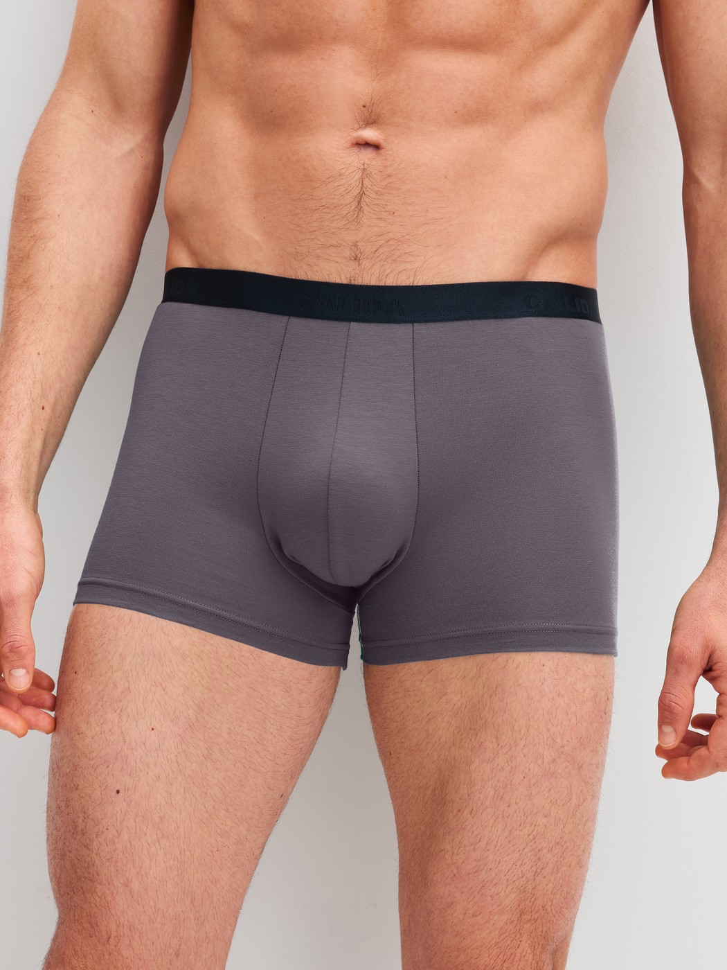 Men model is wearing Boxer Briefs, 3-Pack made of Cotton in Black, Unicoloured from the Cotton Special series by CALIDA, Front view