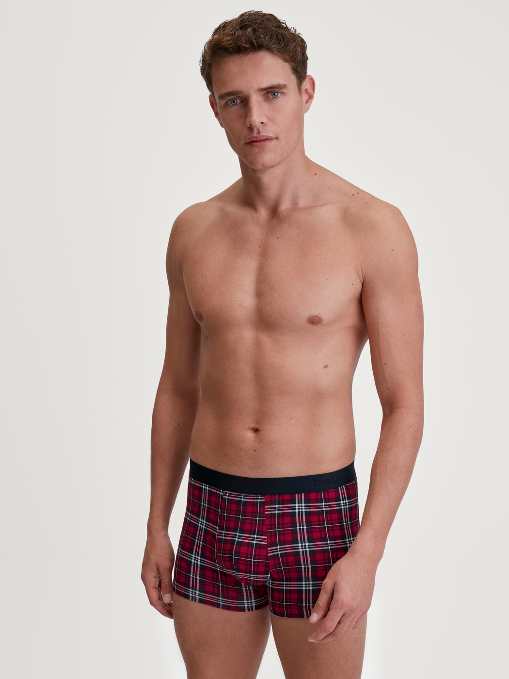 Men model is wearing Boxer brief made of Cotton in Red, Patterned from the Family & Friends series by CALIDA, Outfit