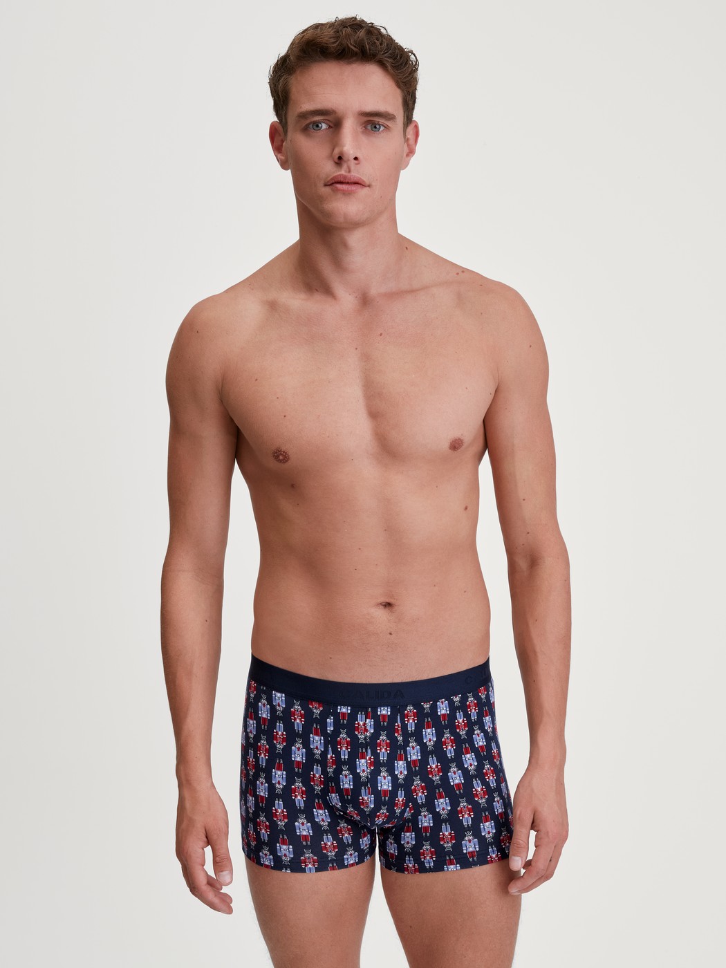 Men model is wearing Boxer brief made of Cotton in Blue, Patterned from the Family & Friends series by CALIDA, Front view