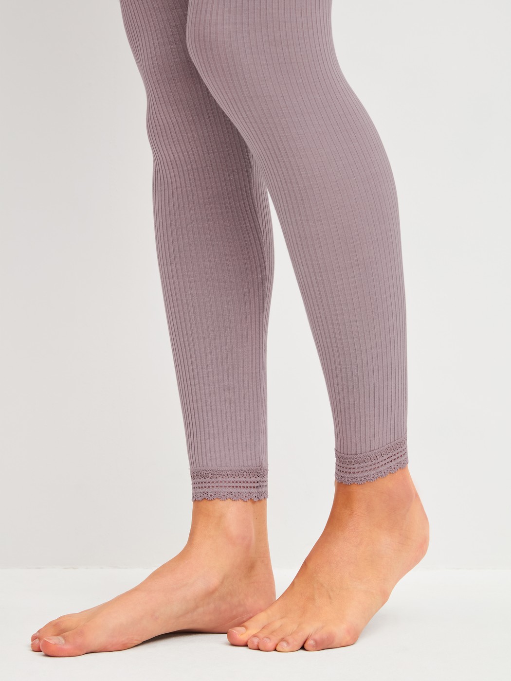 Women model is wearing  made of Wool in Purple, Lace from the Silky Wool Joy series by CALIDA, Detail