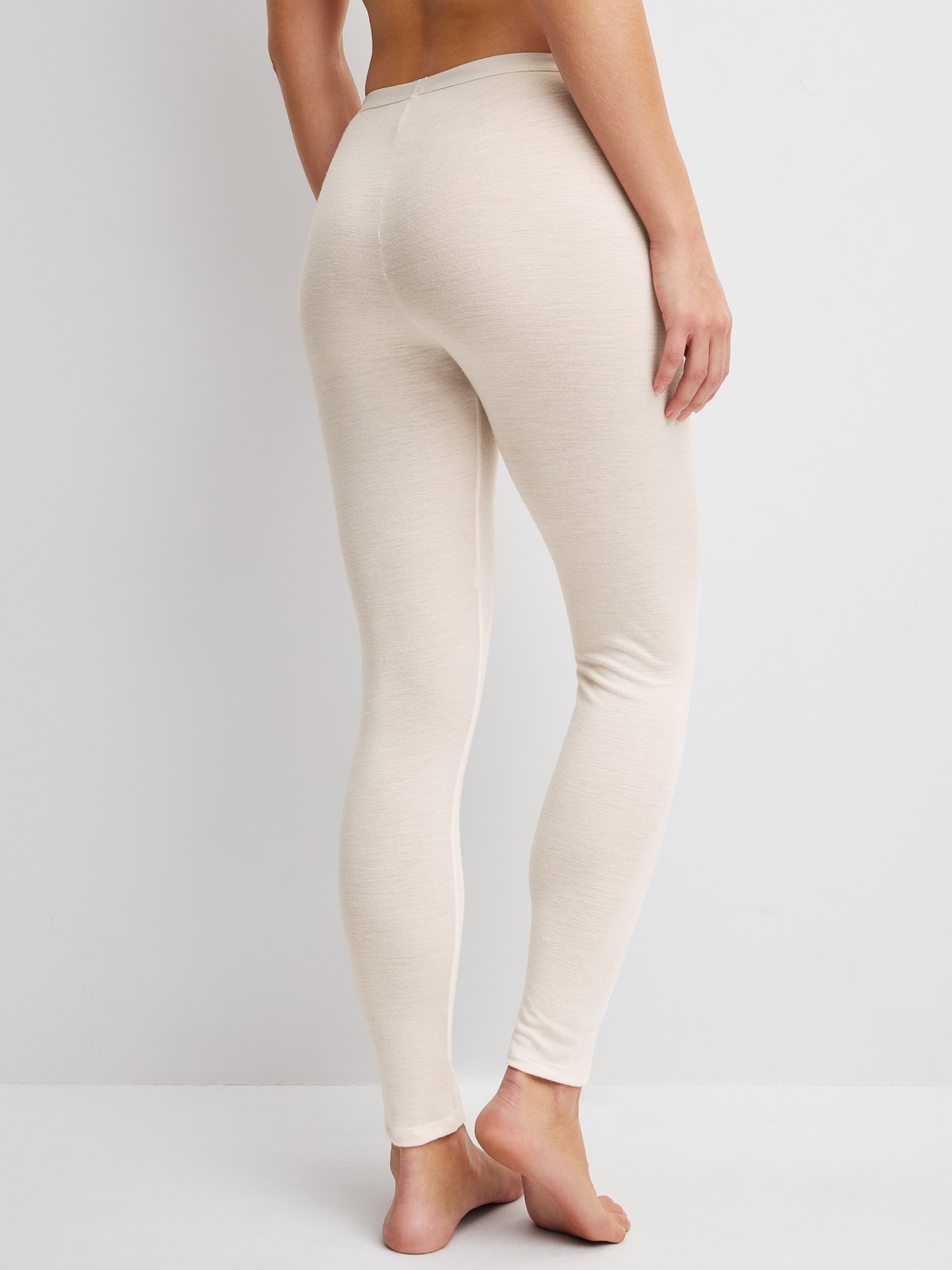 Women model is wearing Wool and silk leggings made of Wool in Beige, Unicoloured from the True Confidence series by CALIDA, Back view
