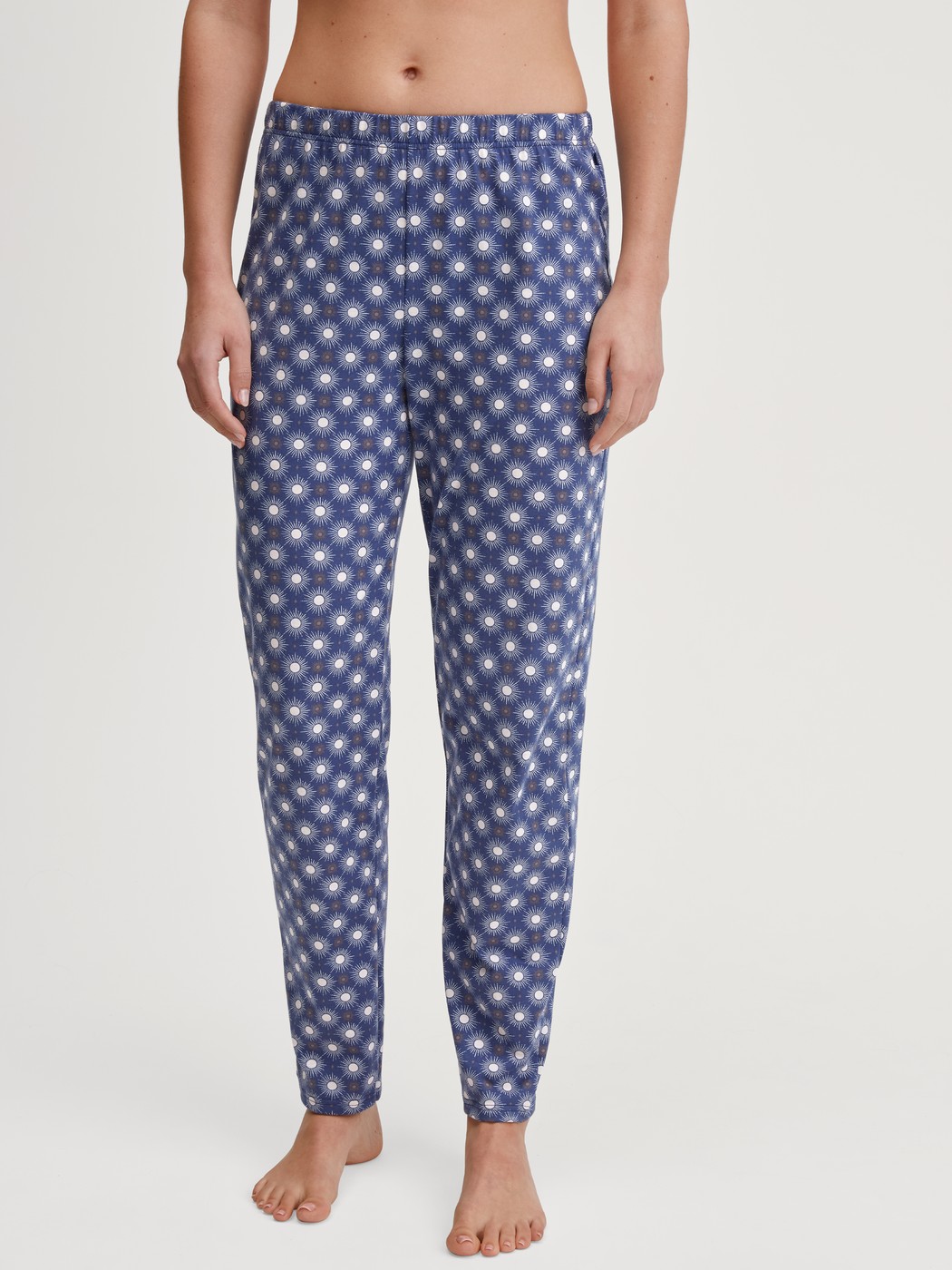 Women model is wearing Pyjama bottom made of 100% Cotton in Blue, Patterned from the Favourites Universe series by CALIDA, Front View