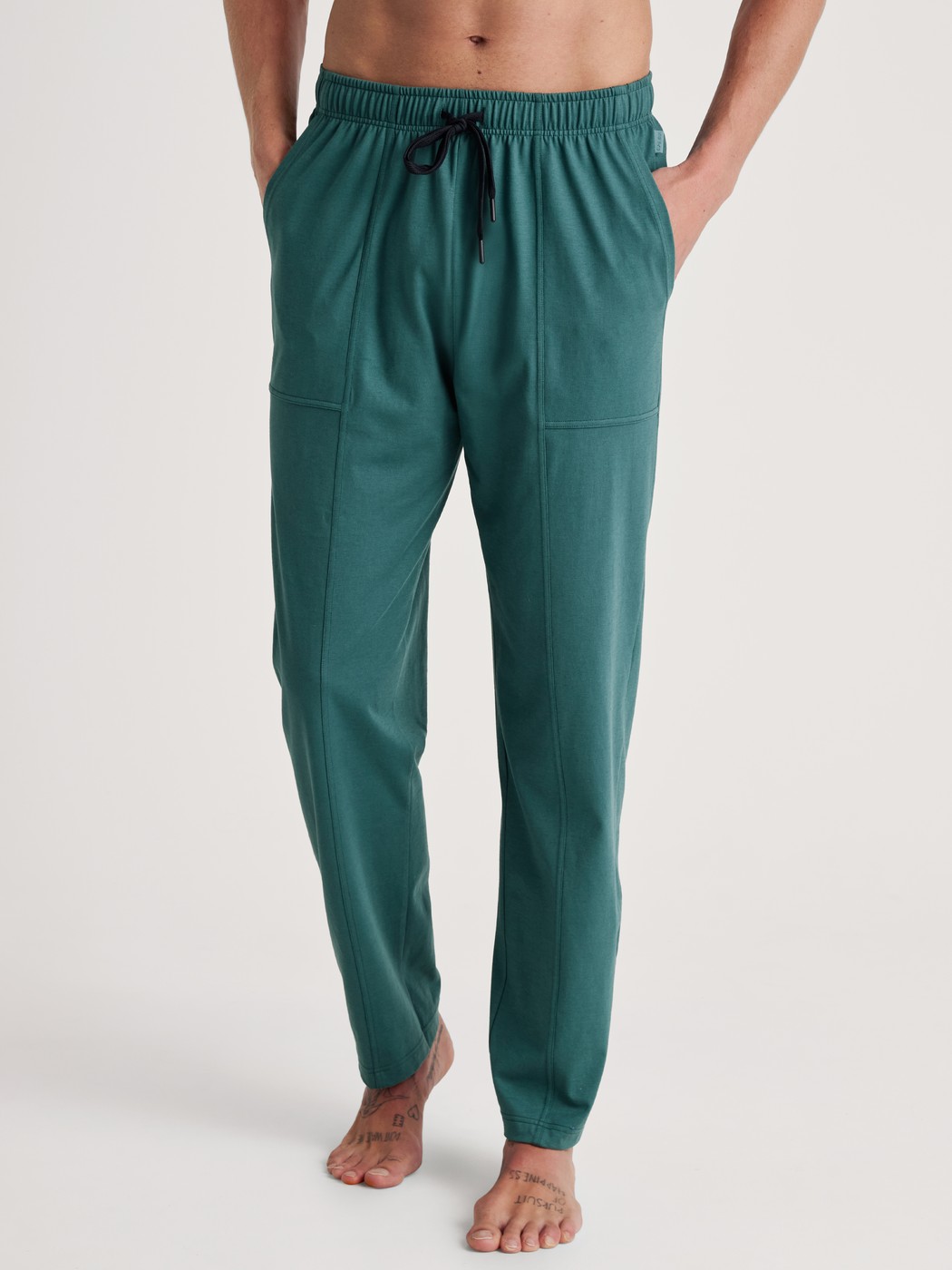 Pantalone con tasche laterali