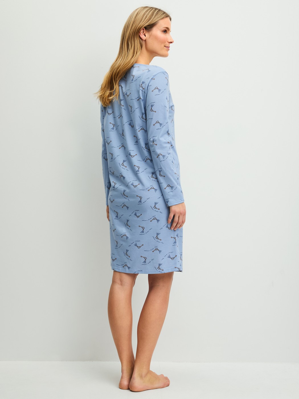Women model is wearing  made of 100% Cotton in Blue, Patterned from the Hotel Nights series by CALIDA, Back view