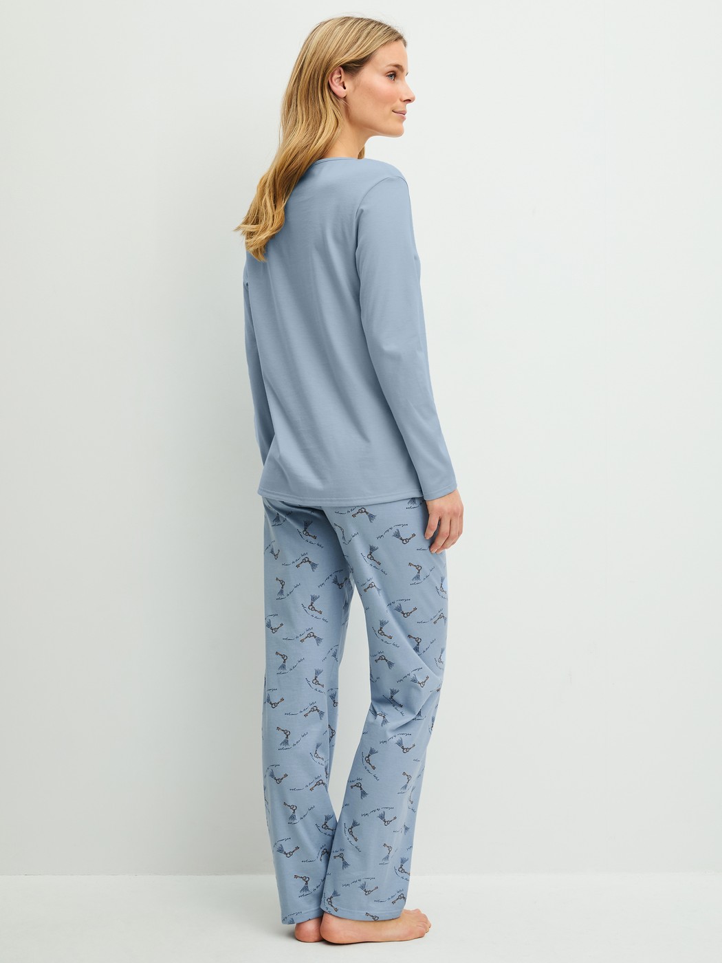 Women model is wearing  made of 100% Cotton in Blue, Patterned from the Hotel Nights series by CALIDA, Back view