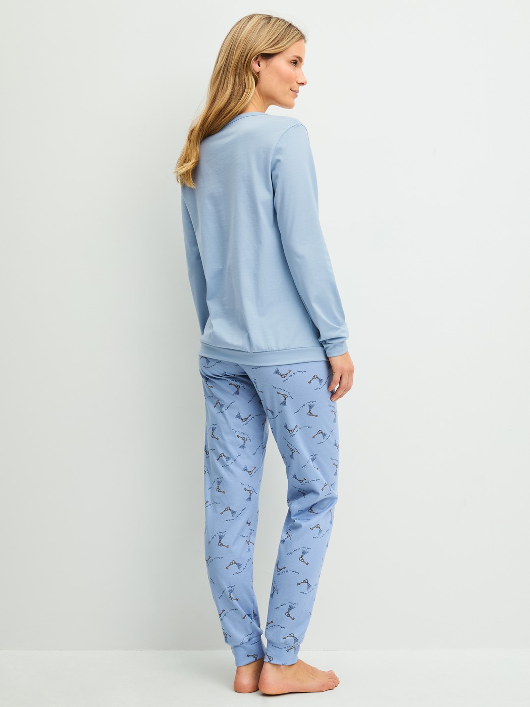 Women model is wearing  made of 100% Cotton in Blue, Patterned from the Hotel Nights series by CALIDA, Back view