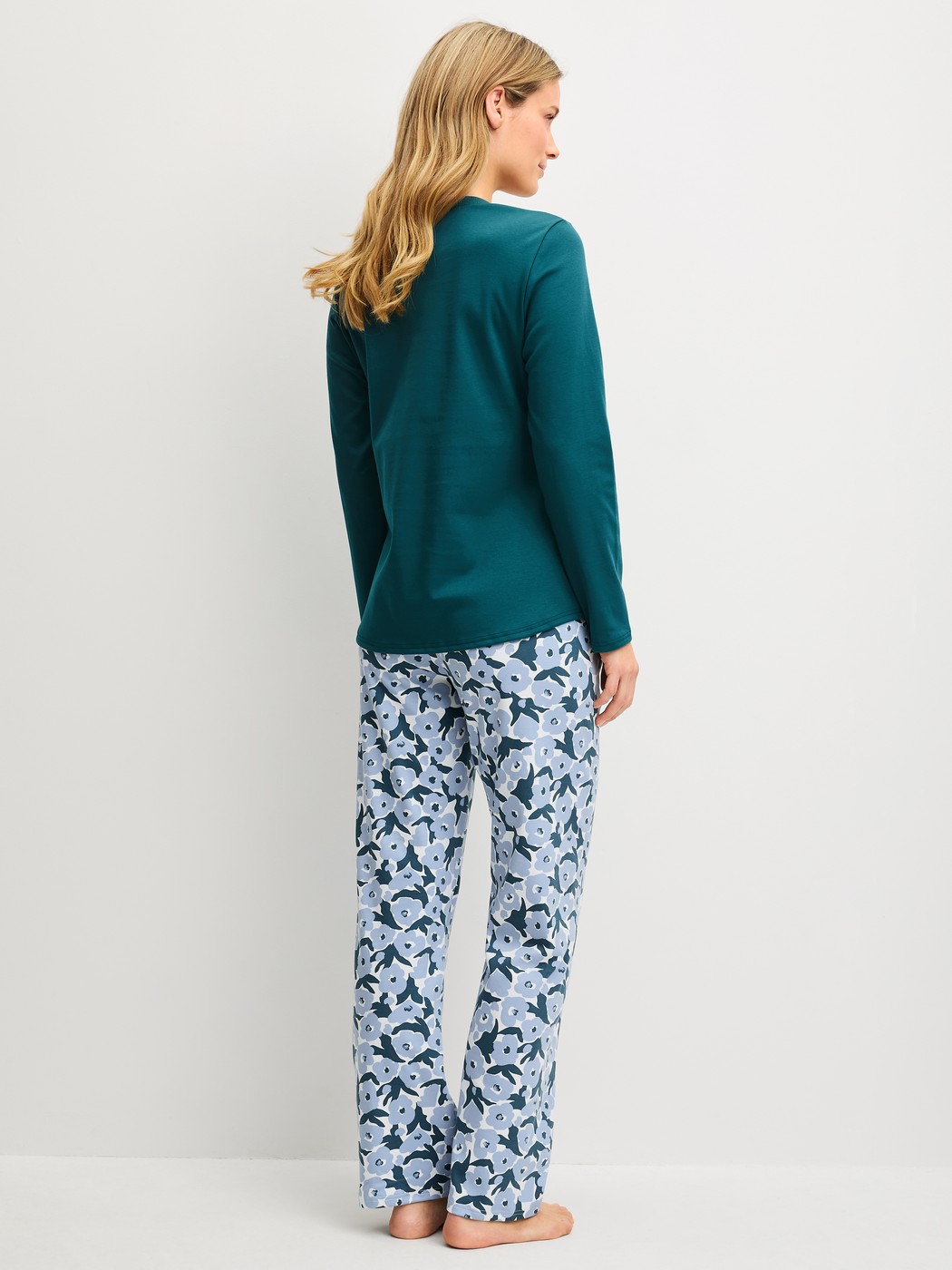 Women model is wearing  made of 100% Cotton in Turquoise, Floral from the Midnight Flowers series by CALIDA, Back view