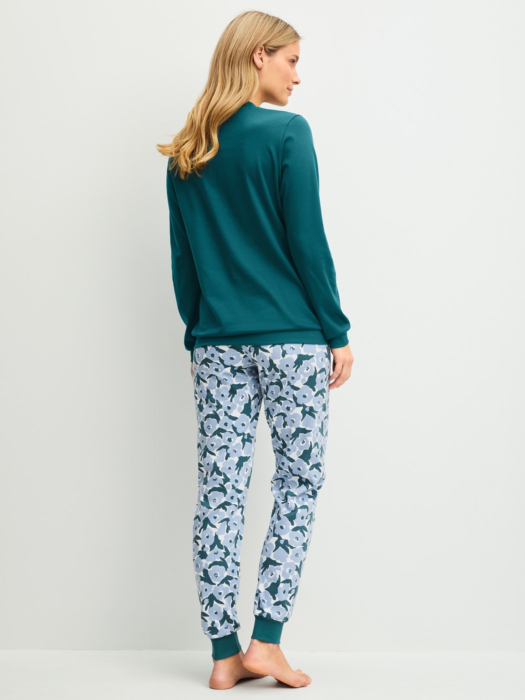 Women model is wearing  made of 100% Cotton in Turquoise, Floral from the Midnight Flowers series by CALIDA, Back view