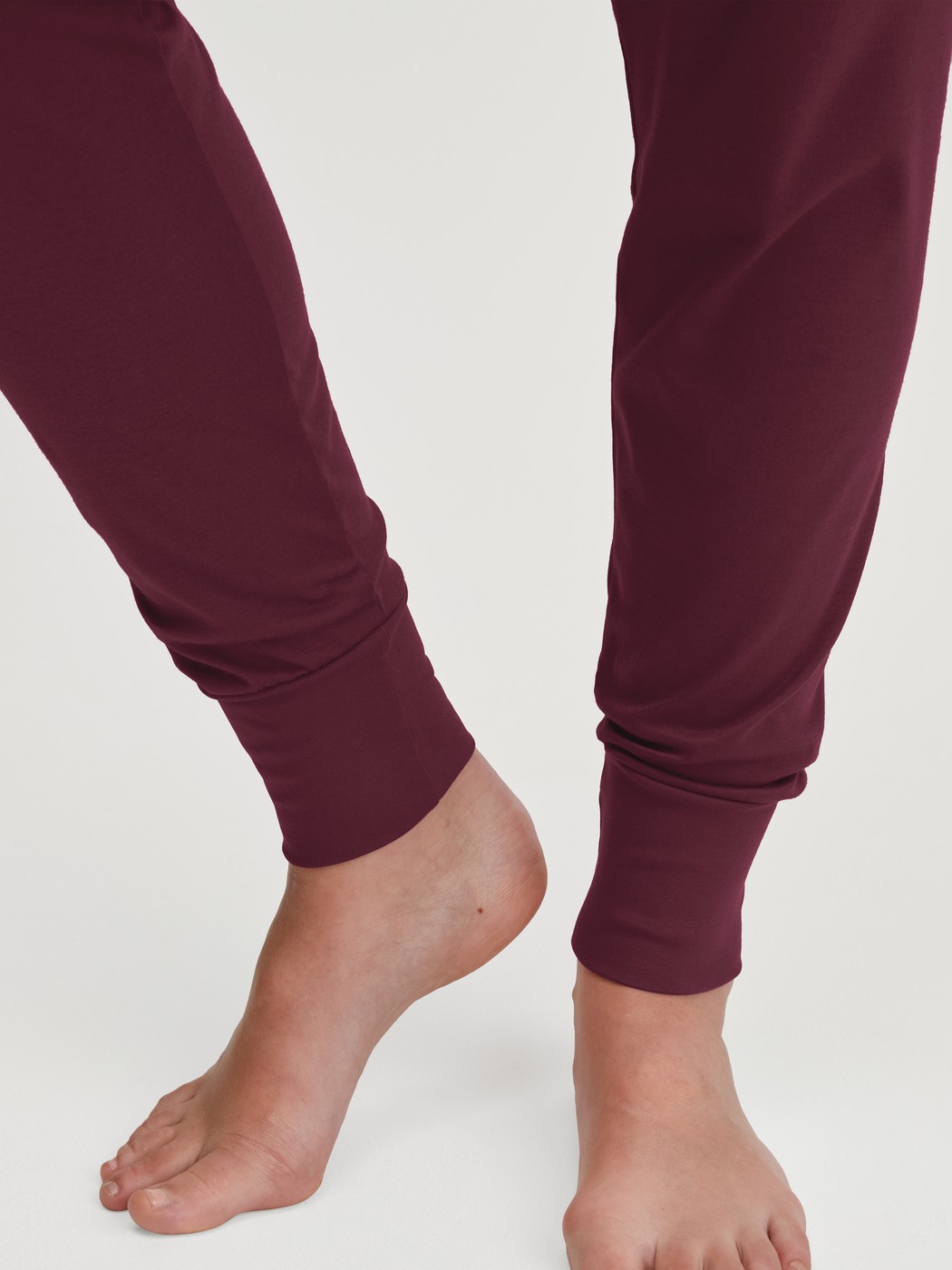 Women model is wearing Pyjama with cuff made of 100% Cotton in Red, Patterned from the Season Special series by CALIDA, Detail