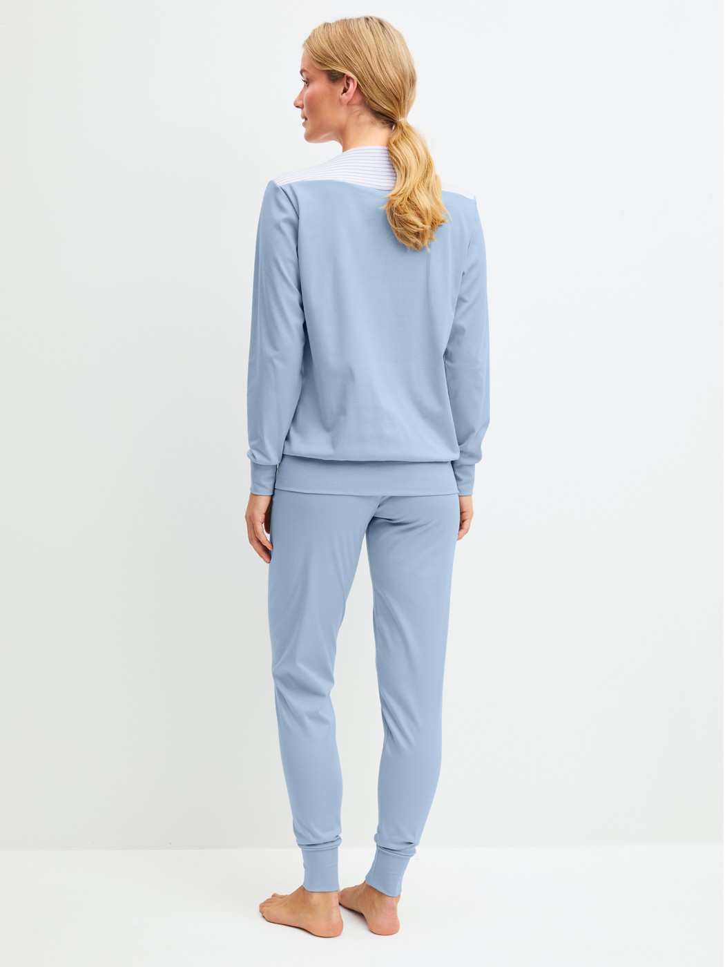Women model is wearing Pyjama with cuff made of 100% Cotton in Grey, Striped from the Soulmate series by CALIDA, Back view