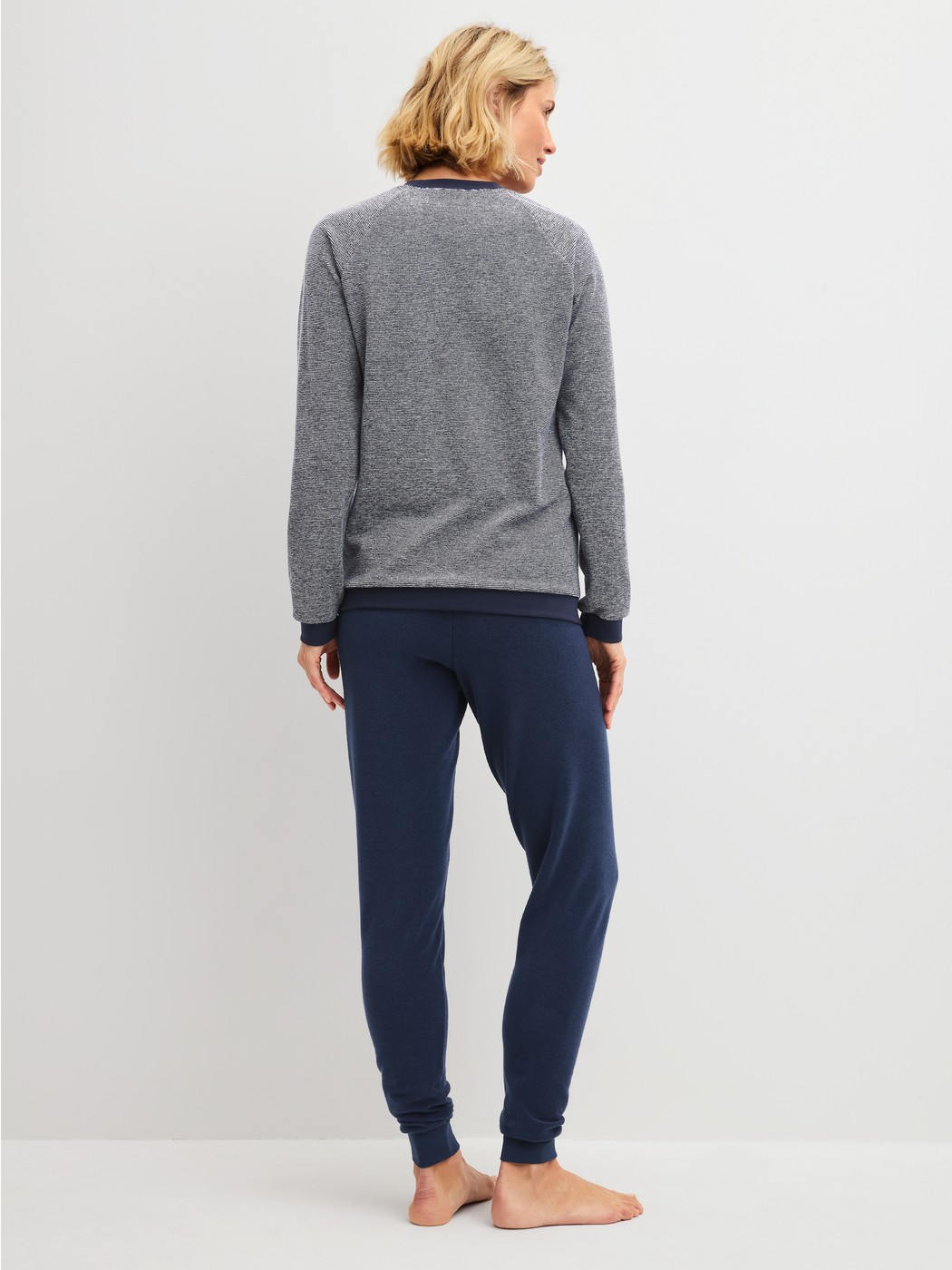 Women model is wearing  made of Cotton in Blue, Striped from the Soft Dreams series by CALIDA, Back view