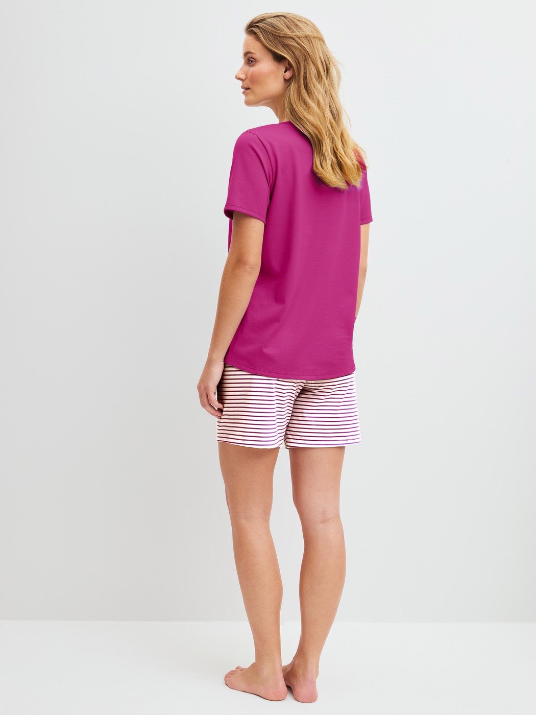 Women model is wearing Short pyjama made of 100% Cotton in Red, Patterned from the Cotton Special series by CALIDA, Back view