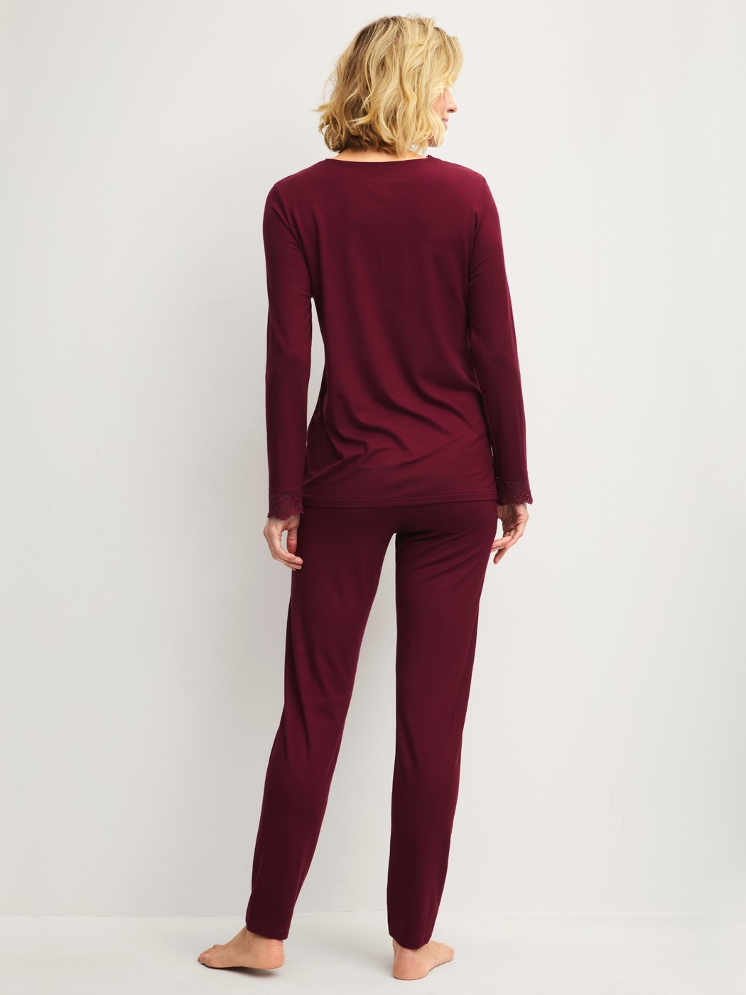 Women model is wearing Pyjamas, long made of Modal in Red, Lace from the Season Special series by CALIDA, Back view