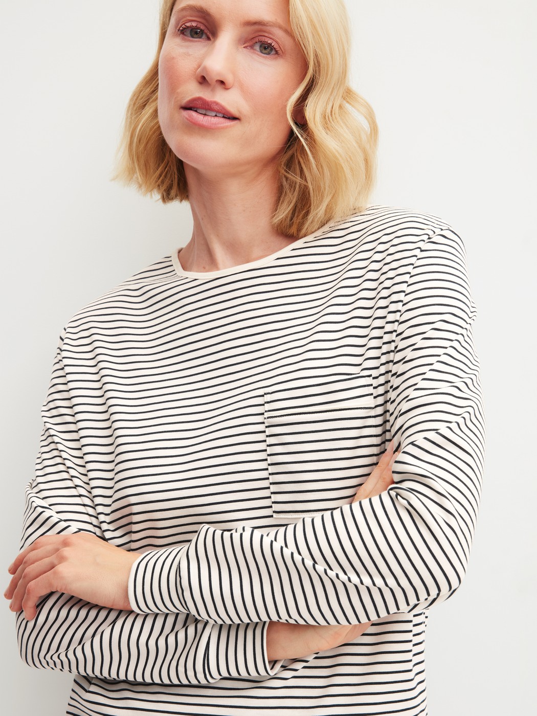 Women model is wearing Pyjama with cuff made of 100% Cotton in Beige, Striped from the Sweet Dreams series by CALIDA, Detail