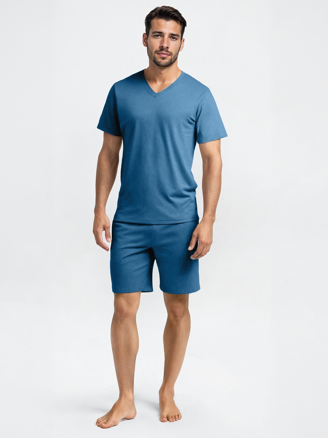 Men model is wearing Short pyjamas made of 100% Cotton in Blue, Unicoloured from the Nightwear Xtra series by CALIDA, Front view