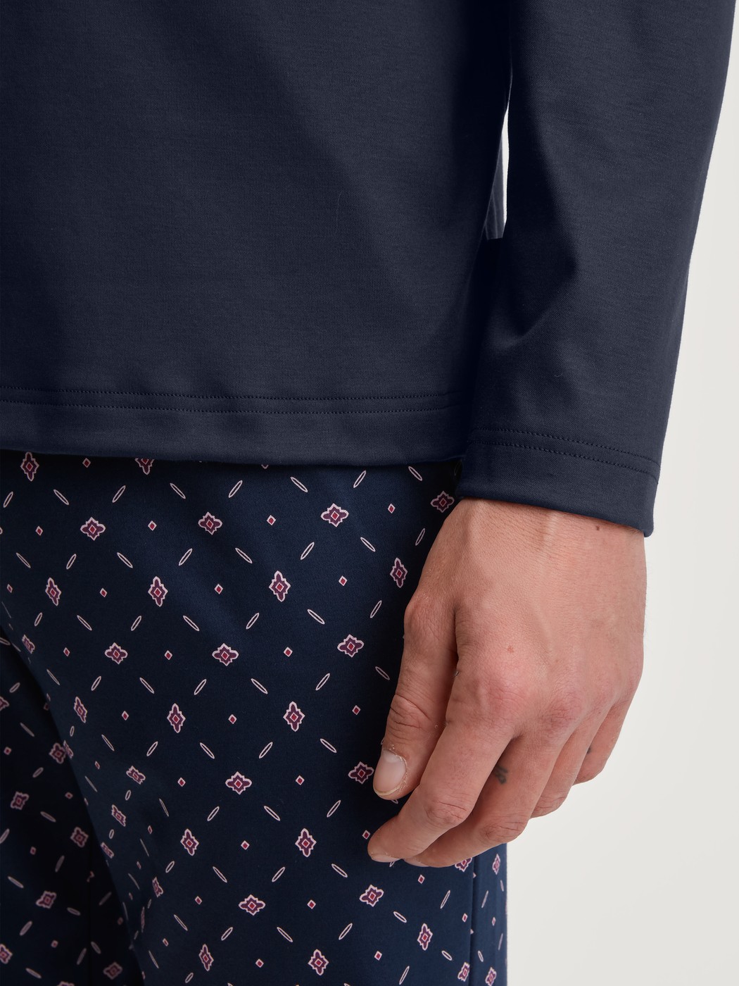 Men model is wearing Pyjamas, long made of 100% Cotton in Blue, Patterned from the Relax Selected 4 series by CALIDA, Detail