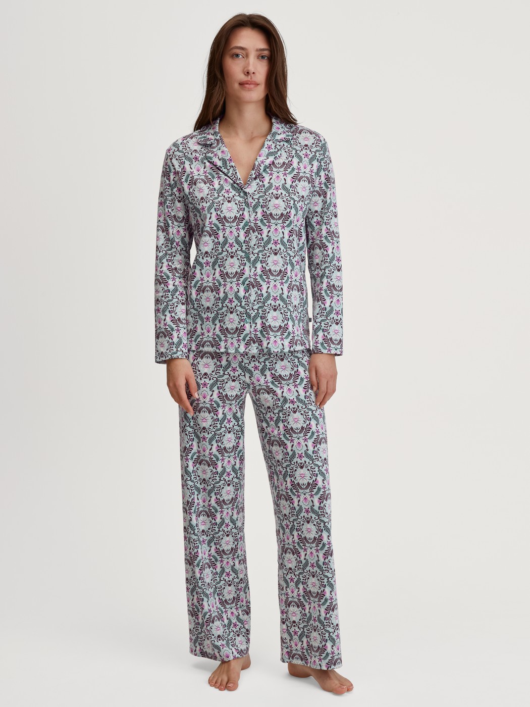 Women model is wearing Button-Up Pyjama made of 100% Cotton in Blue, Patterned from the Autumn Dreams series by CALIDA, Front view