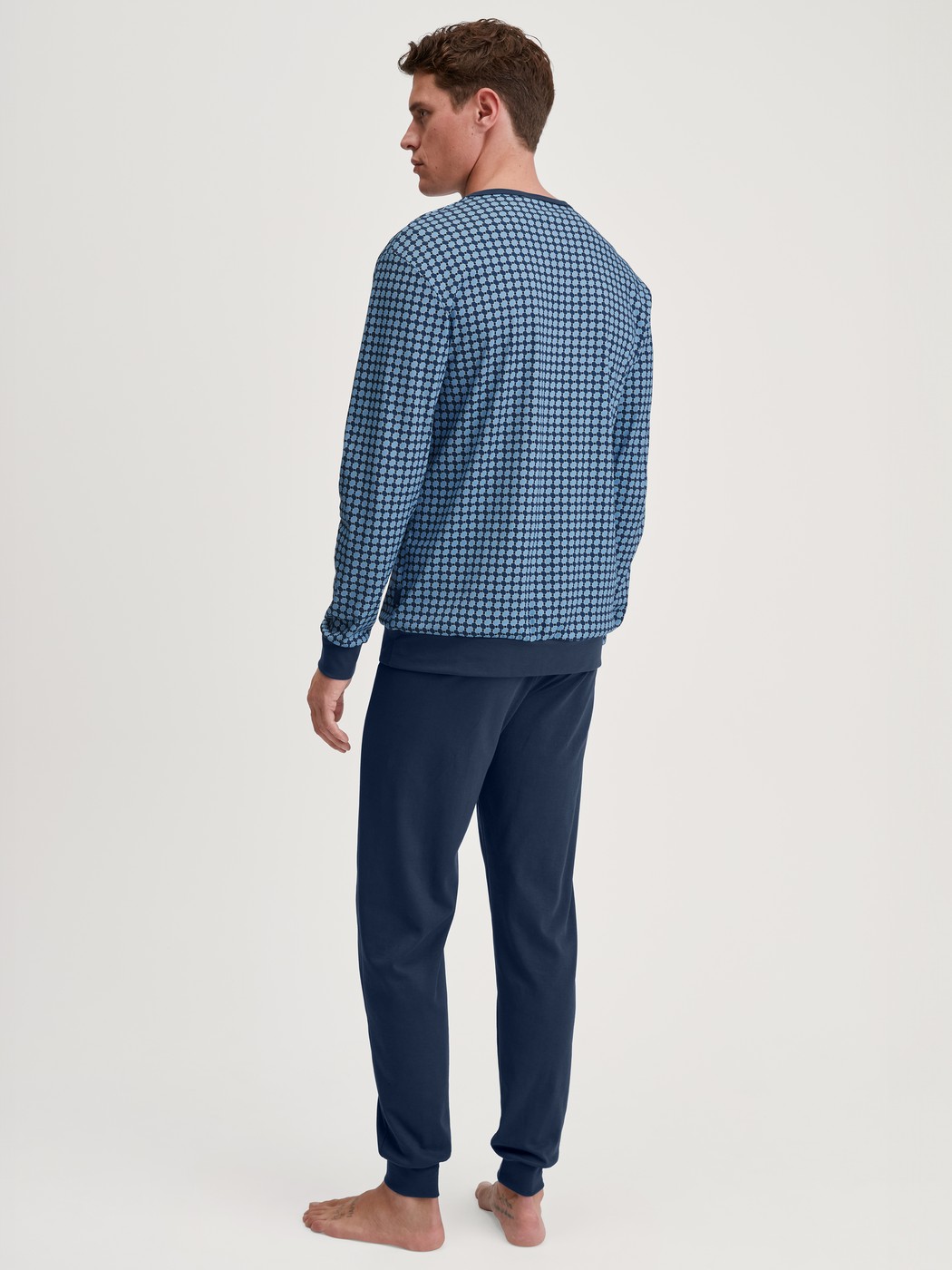 Men model is wearing Pyjama with cuff made of 100% Cotton in Blue, Checked from the Relax Streamline 2 series by CALIDA, Back view