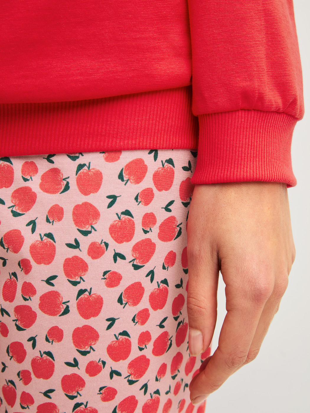Women model is wearing Pyjama with cuff made of 100% Cotton in Red, Patterned from the Fruity Dreams series by CALIDA, Detail