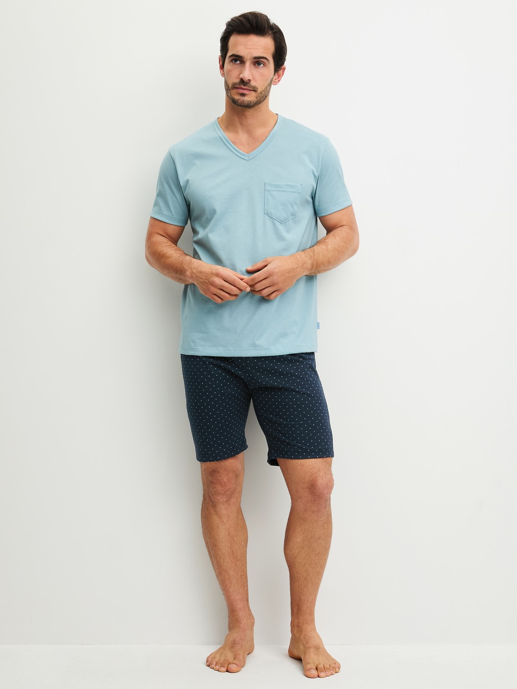 Men model is wearing Short pyjama made of 100% Cotton in Blue, Patterned from the Relax Imprint 3 series by CALIDA, Front view