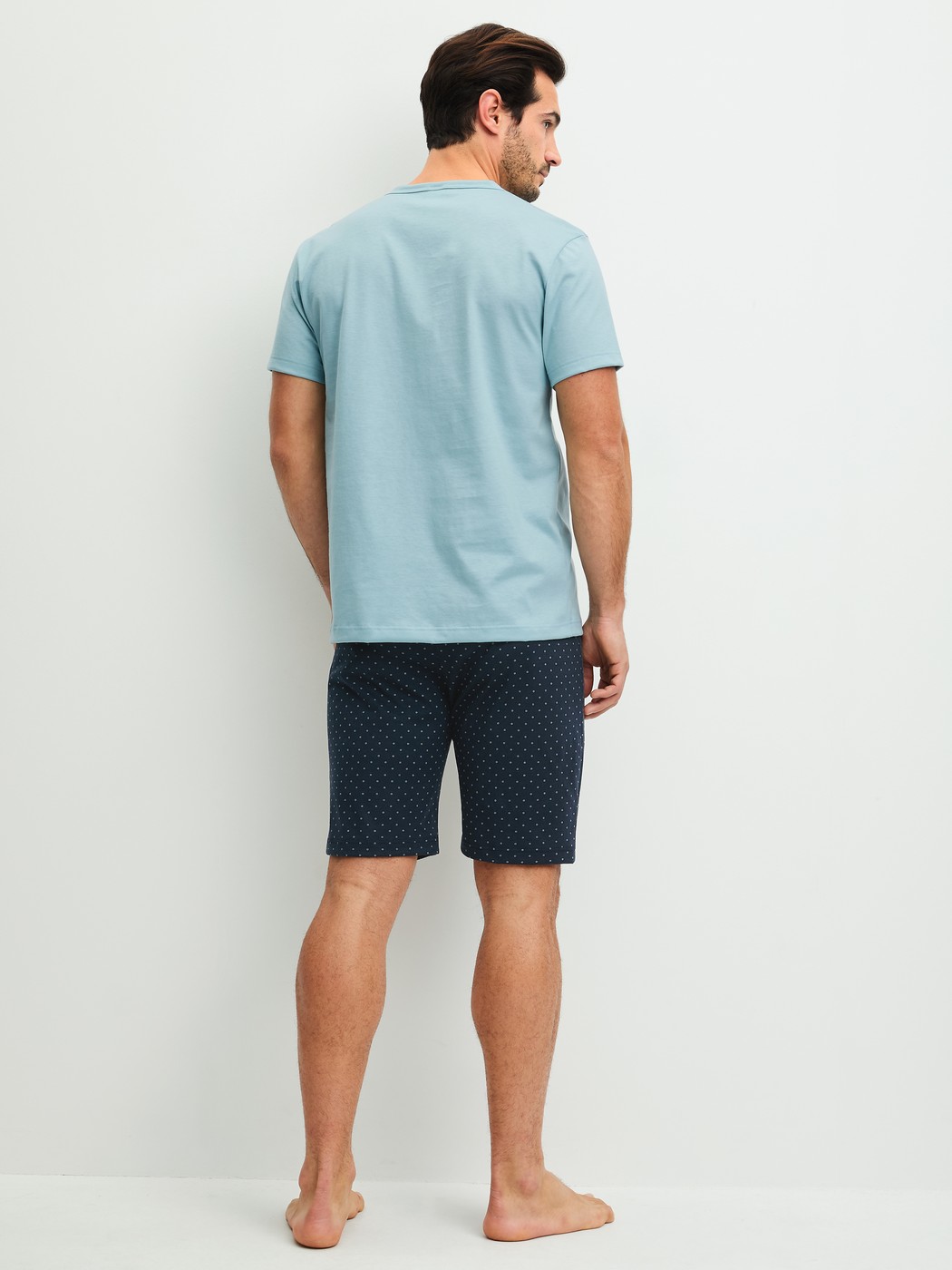 Men model is wearing Short pyjama made of 100% Cotton in Blue, Patterned from the Relax Imprint 3 series by CALIDA, Back view