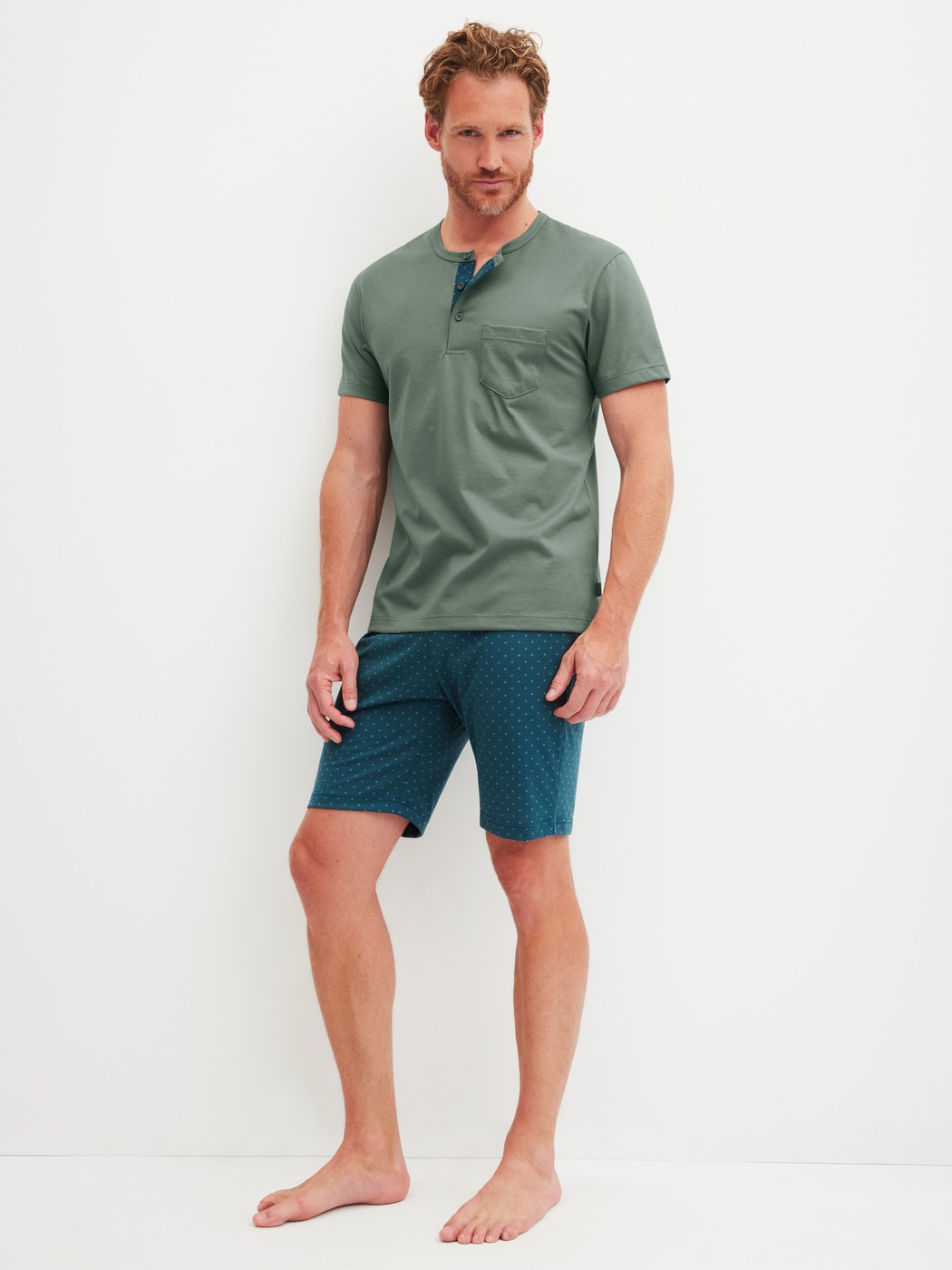 Men model is wearing Short pyjama made of 100% Cotton in Green, Patterned from the Relax Imprint 1 series by CALIDA, Front view