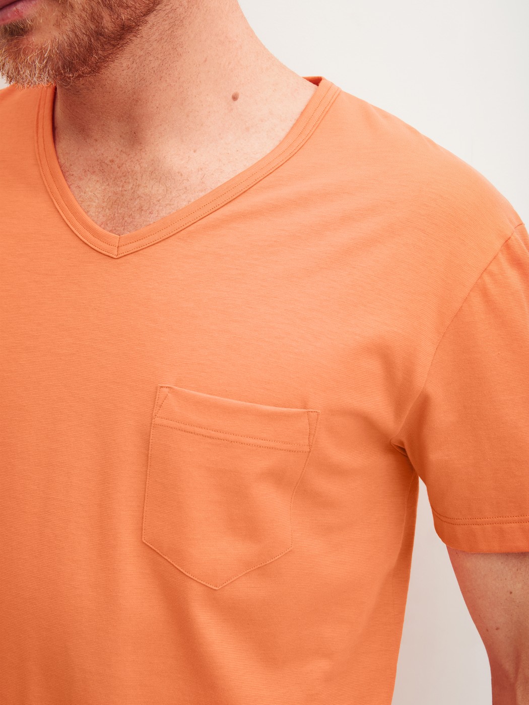 Men model is wearing Short pyjama made of 100% Cotton in Orange, Patterned from the Relax Imprint 4 series by CALIDA, Detail