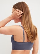 Women model is wearing Bustier with adjustable straps made of Modal in Grey, Unicoloured from the Natural Skin series by CALIDA, Back view