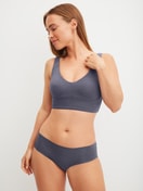 Women model is wearing Bustier with adjustable straps made of Modal in Grey, Unicoloured from the Natural Skin series by CALIDA, Outfit