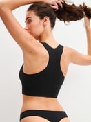 La modella / Il modello Donna indossa Bustier in Modal di colore Nero, Tinta unita, della serie Seamless Natural di CALIDA, Immagine aggiuntiva
