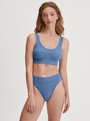 La modella / Il modello Donna indossa Bustier in Cotone di colore Blu, Tinta unita, della serie Elastic di CALIDA, Abbigliamento