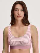 Women model is wearing Bustier made of Cotton in Pink, Striped from the Elastic series by CALIDA, Front view