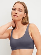 Women model is wearing Bustier made of  in Blue, Unicoloured from the Natural Skin series by CALIDA, Front view