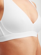 Women model is wearing Soft bra made of Polyamide in White, Unicoloured from the Sleek Skin series by CALIDA, Detail